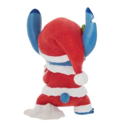 Enesco Disney Santa Stitch With Scrump Figurine, 7.28" 5 Enesco Disney Santa Stitch With Scrump Figurine, 7.28" -Hallmark online Shop Disney Stitch Santa Scrump Figurine 6011561 02