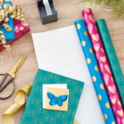 Hallmark Gold And Jewel Tones 3-Pack Wrapping Paper, 105 Sq. Ft. Total 10 Hallmark Gold And Jewel Tones 3-Pack Wrapping Paper, 105 Sq. Ft. Total -Hallmark online Shop Gold and Jewel Tones 3Pack Wrapping Paper Rolls 5EWR6389 02