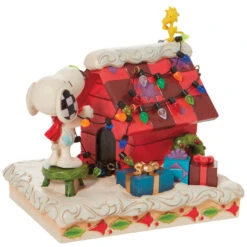 Enesco Jim Shore Peanuts Snoopy With Woodstock Decorating Dog House, 4.8" -Hallmark online Shop Jim Shore Snoopy With Woodstock Decorating Dog House 6010322 02