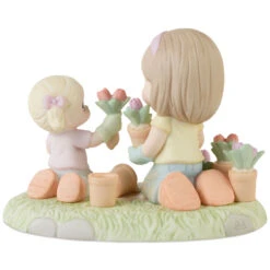 Precious Moments A Mother’s Love Makes A Garden Grow Figurine, 4.4" 9 Precious Moments A Mother’s Love Makes A Garden Grow Figurine, 4.4" -Hallmark online Shop Precious Moments Mother and Daughter Gardening Figurine 223010 04