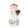 Hallmark Snowtop Lodge Terran S. Gardner Porcelain Ornament 1 Hallmark Snowtop Lodge Terran S. Gardner Porcelain Ornament -Hallmark online Shop Snowman with Flower Pot Keepsake Ornament 2299QXR8119 01