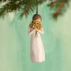 Willow Tree Warm Embrace Ornament, 4" -Hallmark online Shop Willow Tree Girl Holding Yellow Flowers Figurine Ornament 28015 03